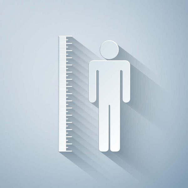 Paper cut Measuring height body icon isolated on grey background. Paper art style. Vector Illustration